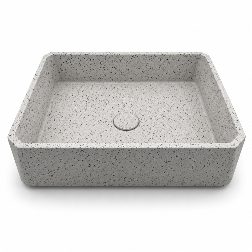 Rectangular concrete vessel sink on a bathroom vanity with wall-mounted black faucet