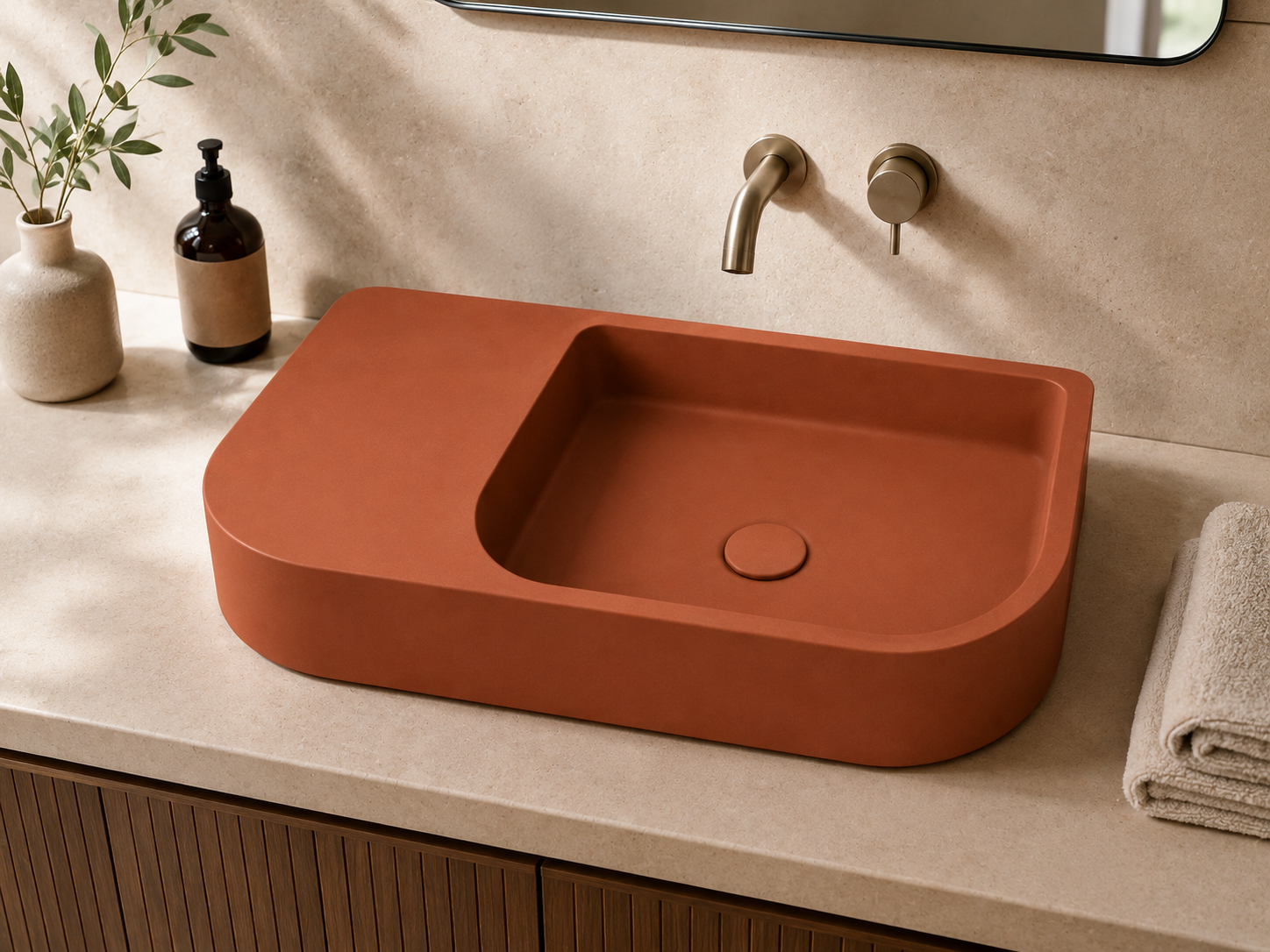 Terracotta concrete floating vanity sink with integrated counter ledge