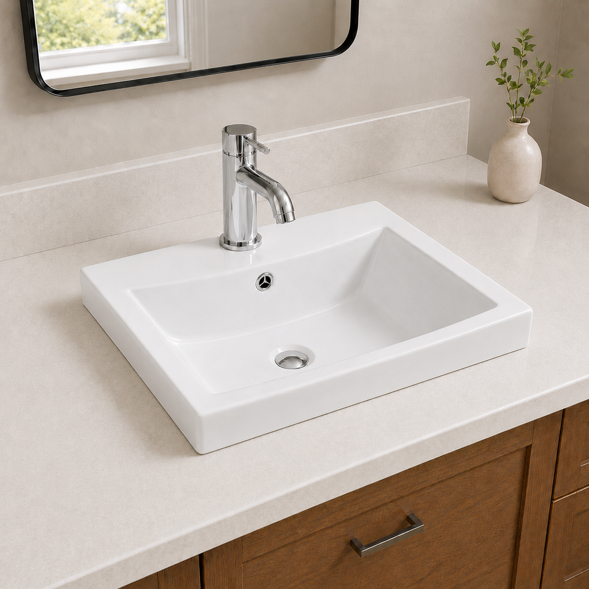 Deep rectangular ceramic vessel sink in white, installed above-counter on a stone top with a tall chrome single-hole faucet