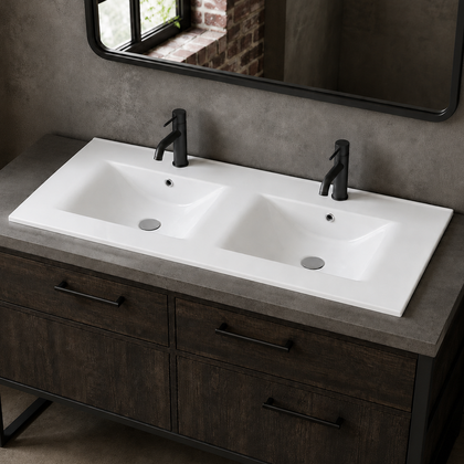 White SN5005-120D double ceramic vanity basin drop-in mounted on a dark wood vanity with two black faucets and a mirror