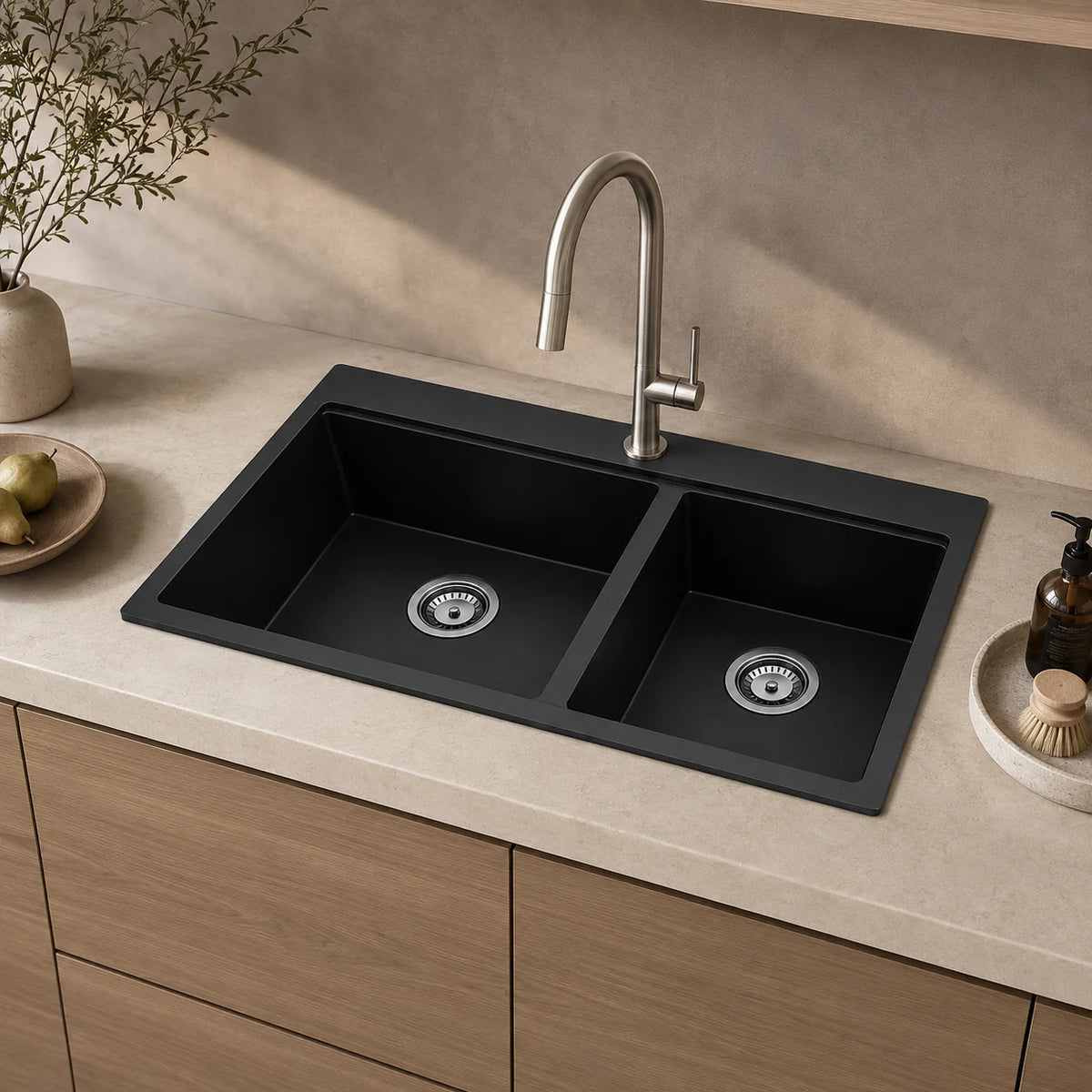 Black double bowl quartz composite sink installed in a styled kitchen — lifestyle scene, SANIKB SN8350.
