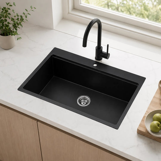 Black rectangular single bowl quartz composite sink installed in a styled kitchen — lifestyle scene, SANIKB SN7848.