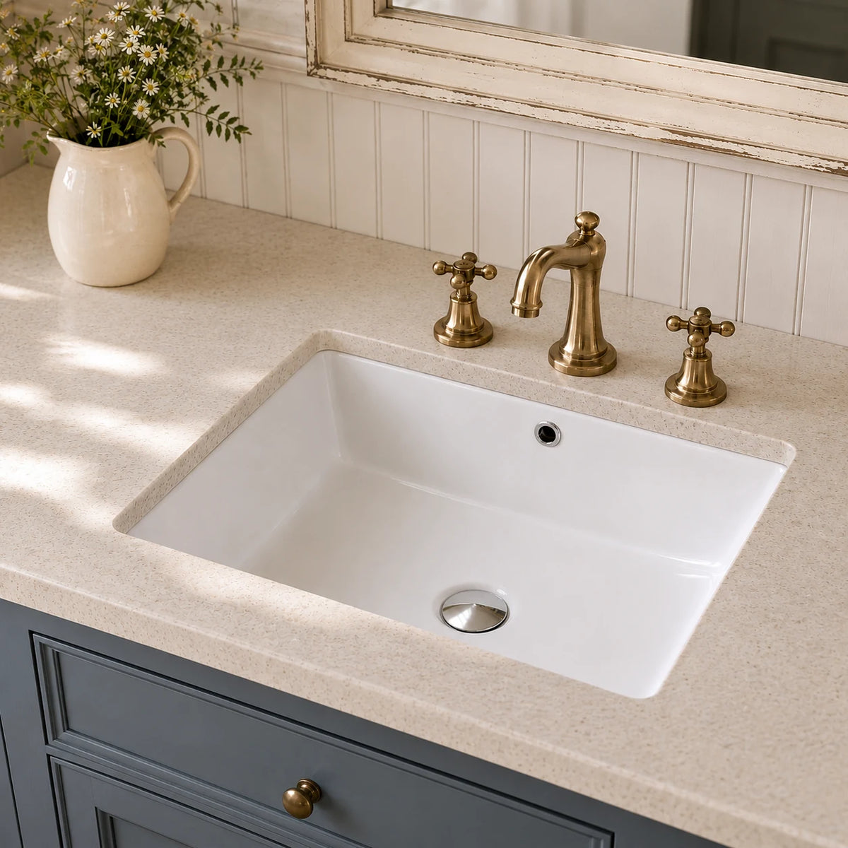 Ceramic undermount bathroom sink installed in a styled bathroom — lifestyle scene, SANIKB SN029.