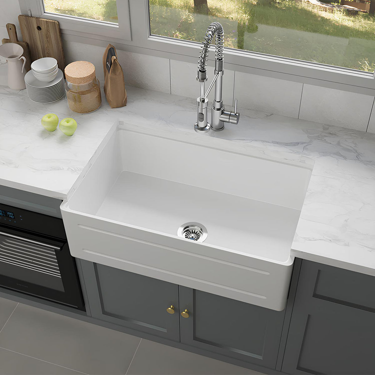 White kitchen sink with silver faucet in a modern kitchen setting