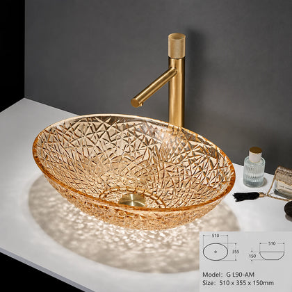 Amber faceted glass vessel sink with gold faucet, oval 510mm bowl