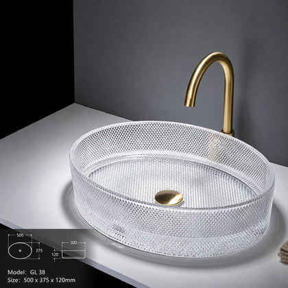 Clear faceted glass vessel sink with gold faucet, oval 500mm decorative bowl
