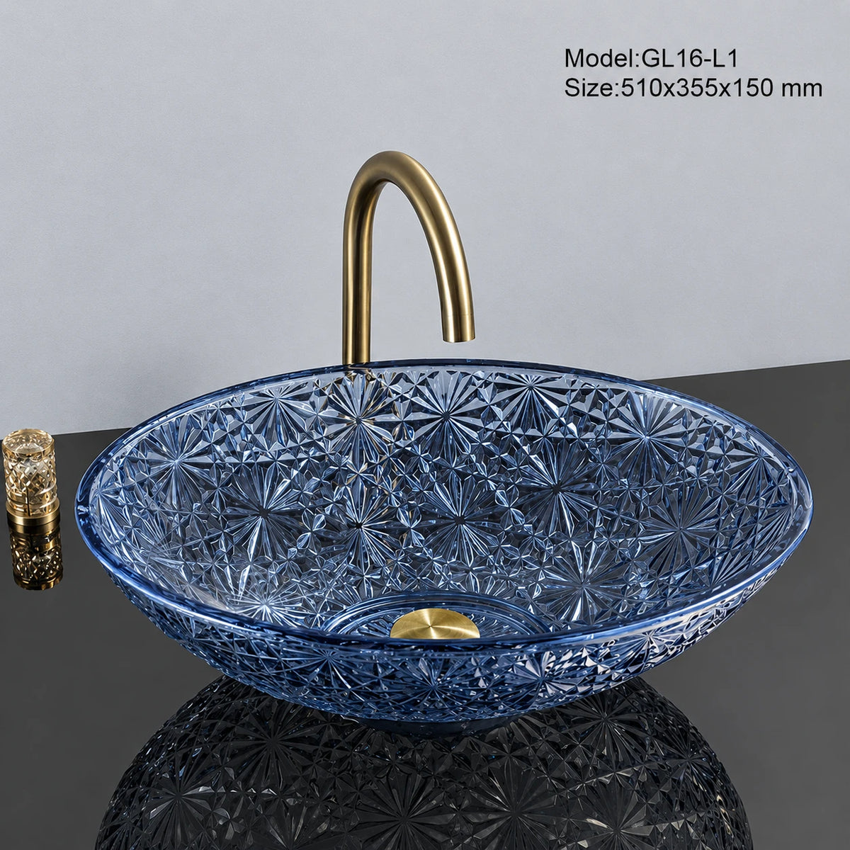 Sapphire blue faceted glass vessel sink with gold faucet, oval 510mm starburst-cut bowl