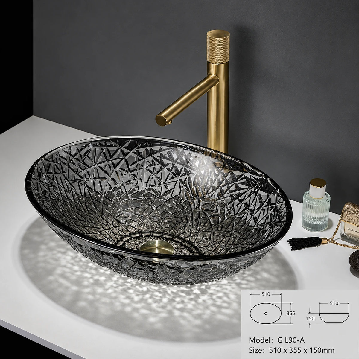 Smoke grey faceted glass vessel sink with gold faucet, oval 510mm bowl
