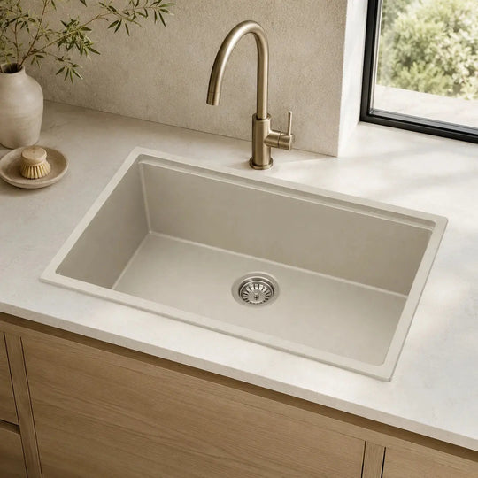 Quartz composite undermount kitchen sink installed in a styled kitchen — lifestyle scene, SANIKB SN8448.