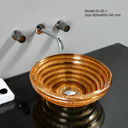 Warm gold spiral-ridged glass vessel sink with chrome faucet, round 400mm bowl