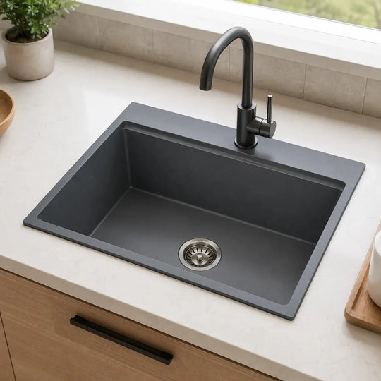 White quartz composite undermount sink installed in a styled kitchen — lifestyle scene, SANIKB SN6459.