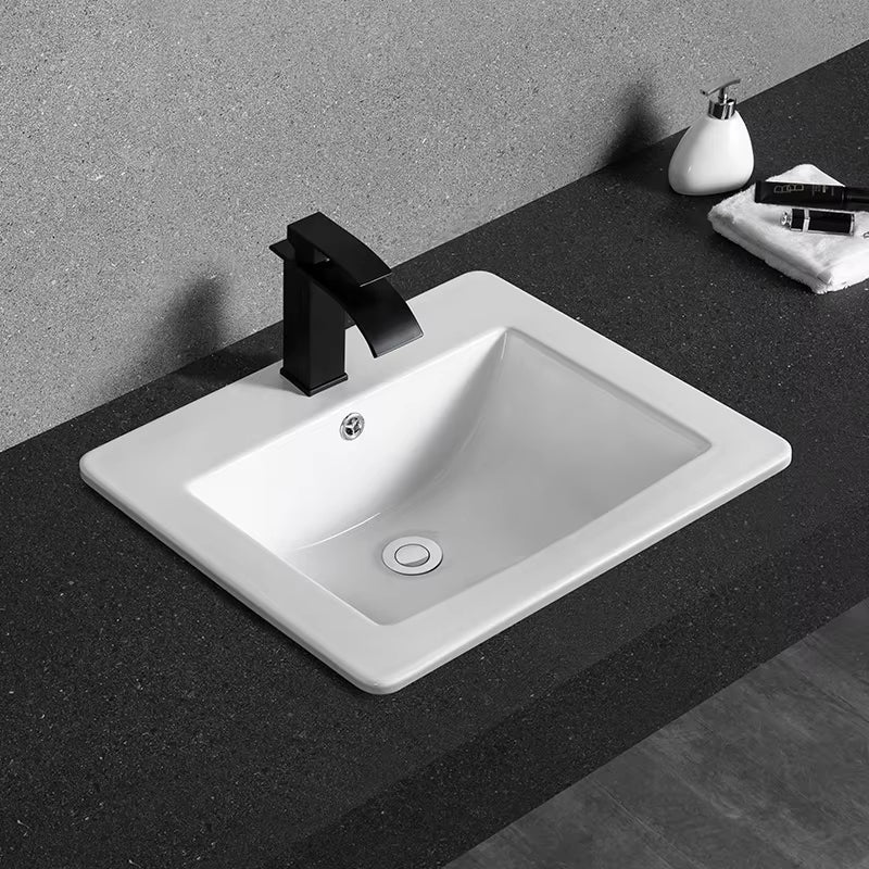 White ceramic vanity sink with smooth glazed basin for bathroom cabinet