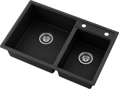 Black offset double bowl quartz composite kitchen sink with larger left basin, smaller right basin, and two faucet holes