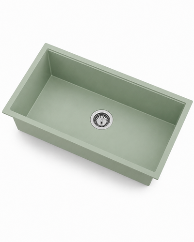 Green single bowl quartz composite kitchen sink with rectangular basin and center drain