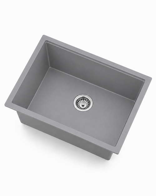 Gray single bowl quartz composite kitchen sink with stainless drain, angled product view