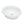 Oval ceramic basin at a three-quarter angle showing the decorative fluted interior, center drain, and front overflow