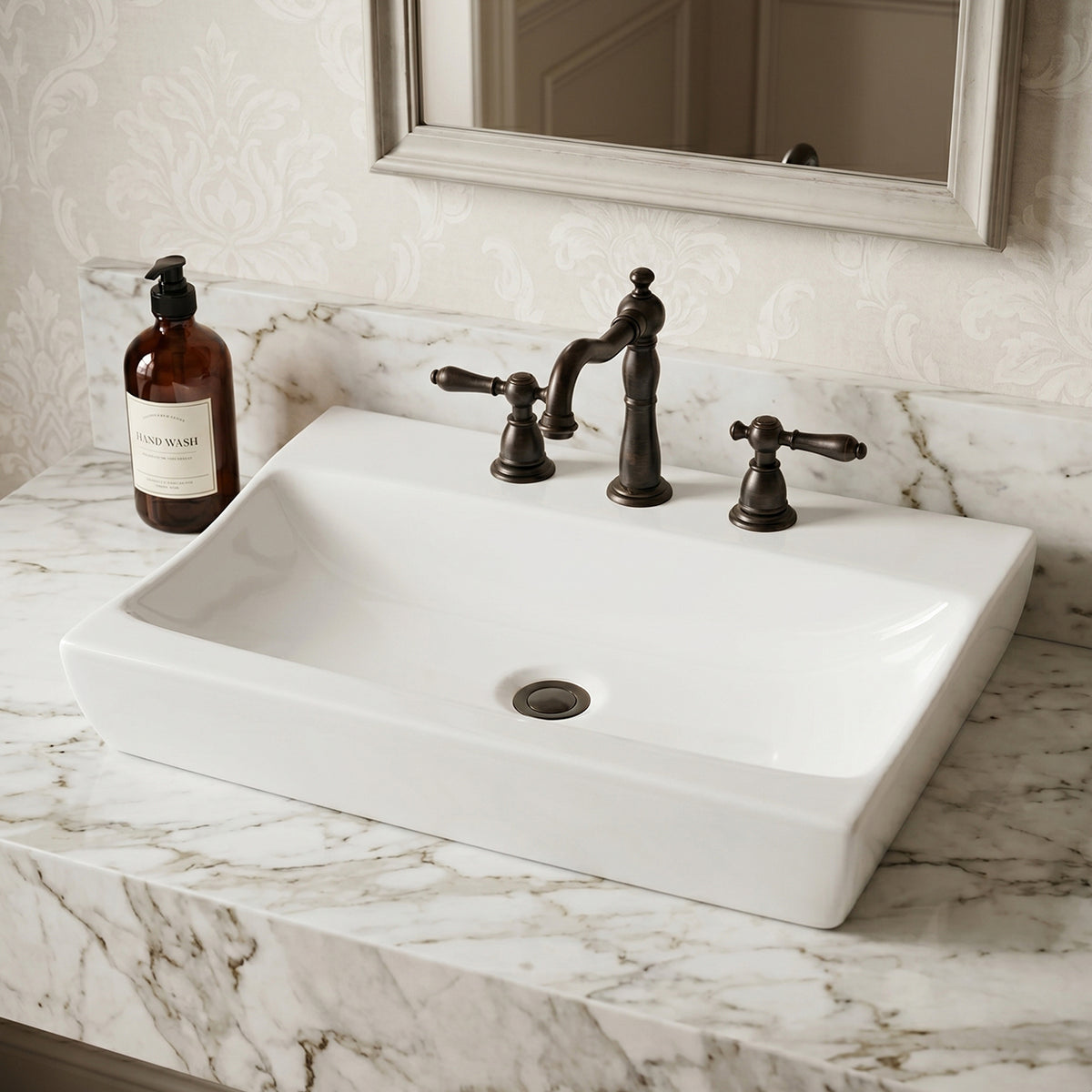 White 25 inch low profile ceramic vessel sink on a marble vanity top with a bronze-finish bathroom faucet