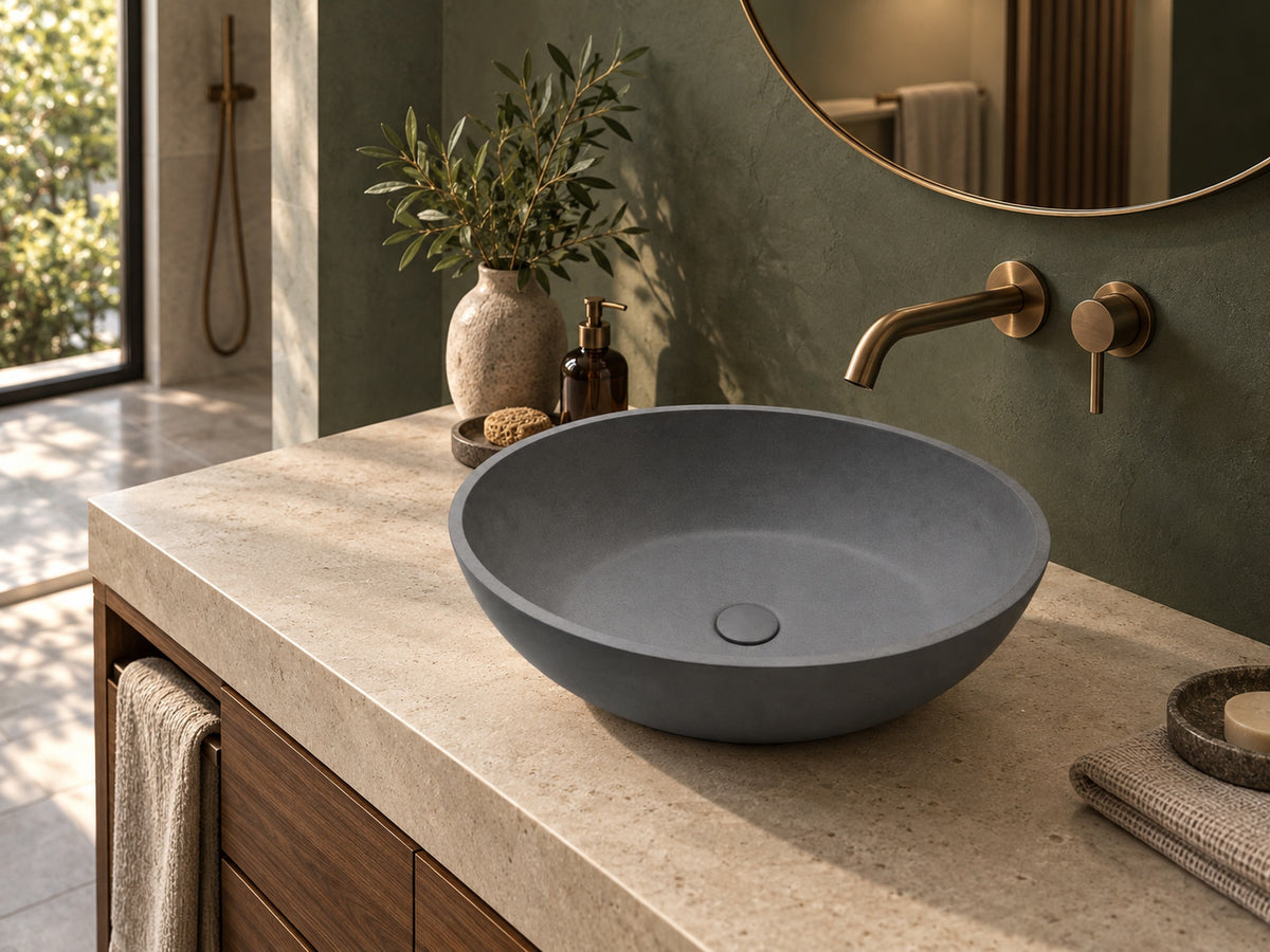 C0014 charcoal concrete vessel sink in a boutique hotel bathroom