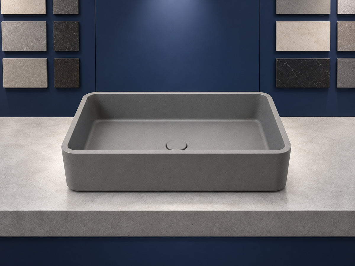 C0025 grey rectangular concrete vessel sink in a serviced apartment bathroom