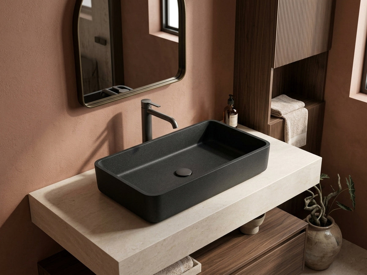 C0040 charcoal concrete vessel sink in a boutique hotel bathroom