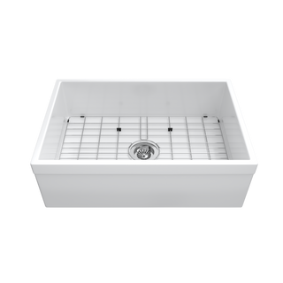 White apron-front single-bowl fireclay farmhouse sink with stainless bottom grid and strainer — SANIKB SNT3020H