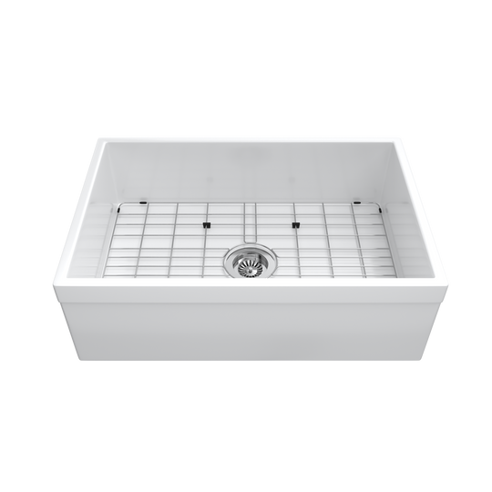 White apron-front single-bowl fireclay farmhouse sink with stainless bottom grid and strainer — SANIKB SNT3020H