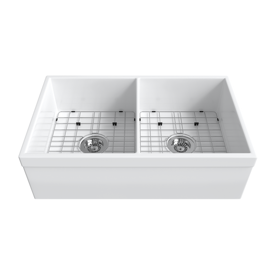 White apron-front double-bowl fireclay farmhouse sink with two stainless bottom grids and strainers — SANIKB SNT3320HD