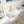 33-inch curved-apron fireclay farmhouse sink installed in a modern kitchen — SANIKB SN3321