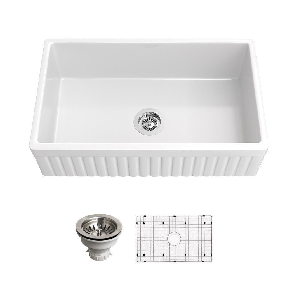 Reversible fluted-apron single-bowl fireclay farmhouse sink in white with bottom grid and strainer — SANIKB SN3320T