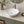 Asymmetrical ceramic vessel sink installed in a styled bathroom — lifestyle scene, SANIKB SN175.