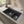 Black double bowl quartz composite kitchen sink installed in a styled kitchen — lifestyle scene, SANIKB SN8456.