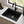 Black drop in quartz composite sink installed in a styled kitchen — lifestyle scene, SANIKB SN5855.