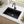 Black rectangular single bowl quartz composite sink installed in a styled kitchen — lifestyle scene, SANIKB SN7848.