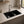 Blue double bowl quartz composite sink installed in a styled kitchen — lifestyle scene, SANIKB SN8344.