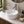 Deep round ceramic vessel sink installed in a styled bathroom — lifestyle scene, SANIKB SN134-537.