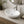 Oval ceramic vessel sink installed in a styled bathroom — lifestyle scene, SANIKB SN188.