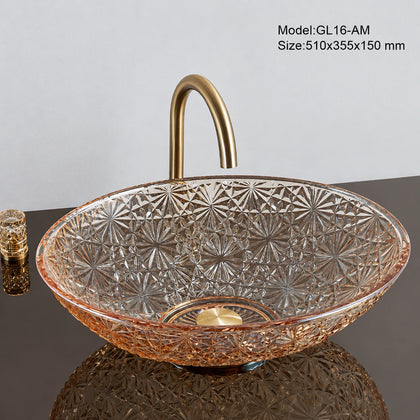 Amber faceted glass vessel sink with gold faucet, oval 510mm starburst-cut bowl
