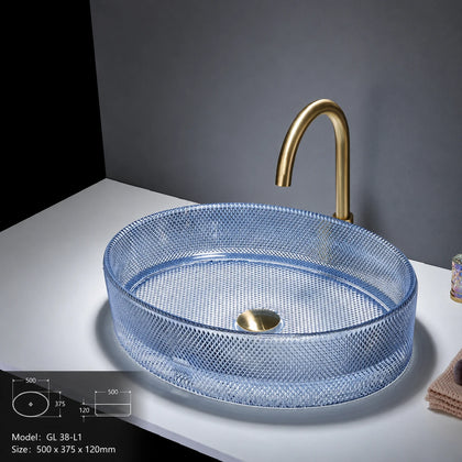 Blue-tinted faceted glass vessel sink with gold faucet, oval 500mm bowl