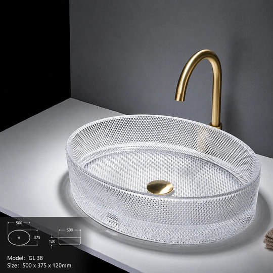 Clear faceted glass vessel sink with gold faucet, oval 500mm decorative bowl
