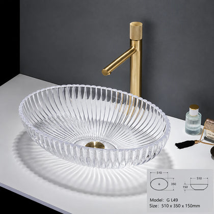 Clear fluted oval glass vessel sink with gold faucet, 510mm ingot art basin