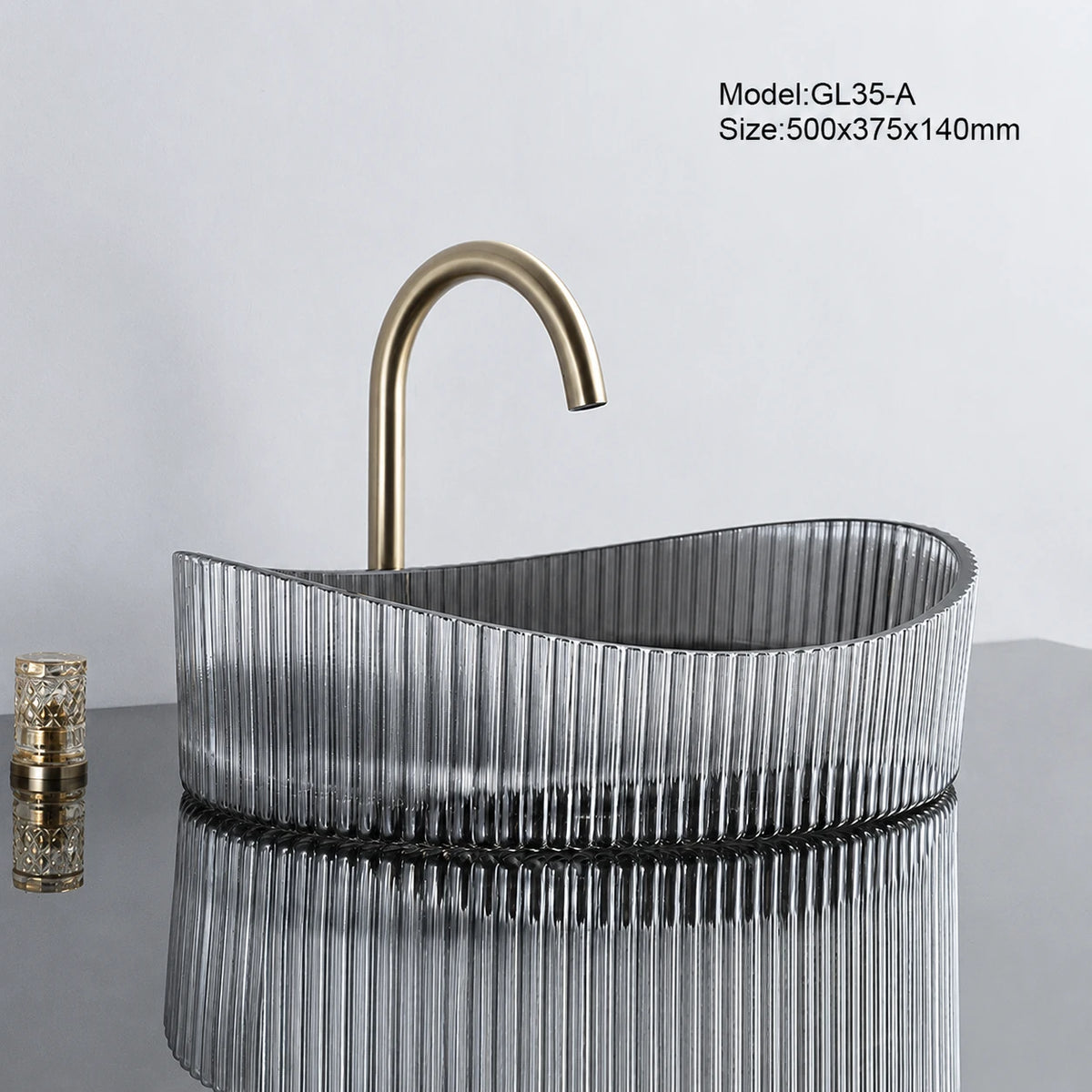 Smoke grey fluted oval glass vessel sink with gold faucet, 500mm bathroom basin