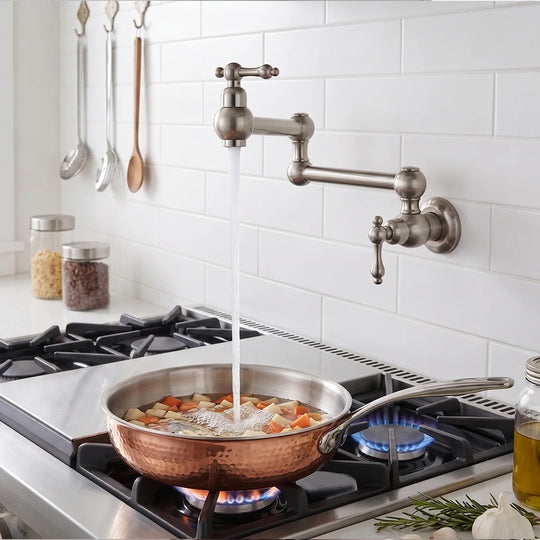 Brushed nickel wall-mount pot filler over a gas stovetop filling a copper pan — SANIKB FYF-05042 solid brass kitchen pot filler faucet in use.
