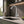 Pull down kitchen faucet brass, installed kitchen lifestyle scene — SANIKB FYF-05018