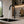 Pull down kitchen faucet brass, installed kitchen lifestyle scene — SANIKB FYF-05033