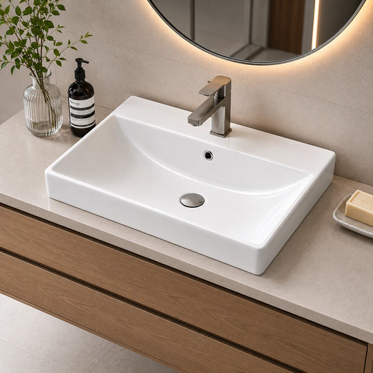 Rectangular ceramic vanity sink installed in a styled bathroom — lifestyle scene, SANIKB SN503.