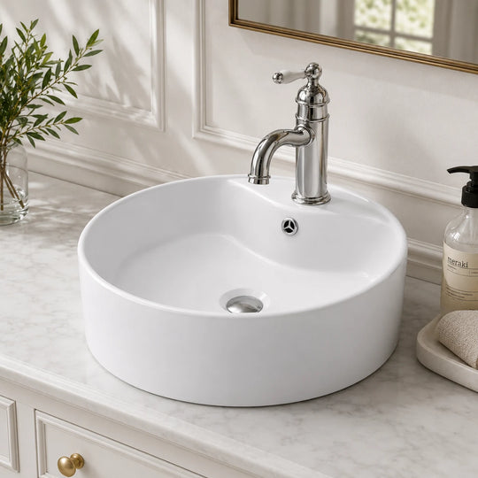 Round ceramic vessel sink with faucet deck installed in a styled bathroom — lifestyle scene, SANIKB SN103.
