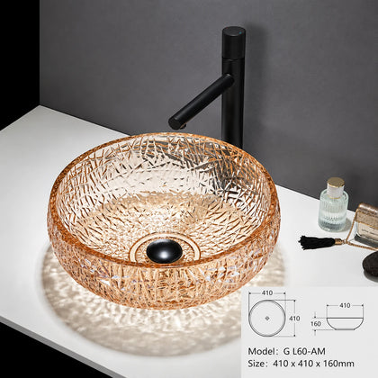 Amber faceted glass vessel sink with black faucet, round 410mm bowl