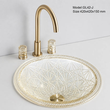 Clear glass vessel sink with gold rim and gold faucet, round 420mm starburst-cut bowl
