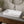 Slim rectangular ceramic vessel sink installed in a styled bathroom — lifestyle scene, SANIKB SN174.