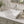 Sloped square ceramic vessel sink installed in a styled bathroom — lifestyle scene, SANIKB SN105-014.